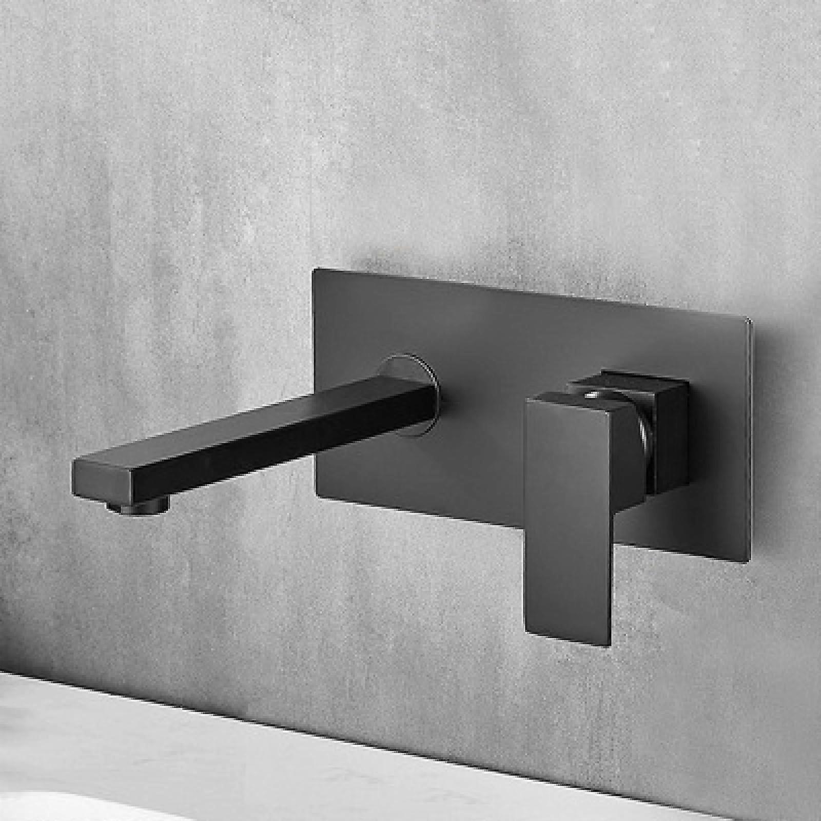 Builtin basin faucet with integrated hot and cold wallmounted bidet spray, a black model.