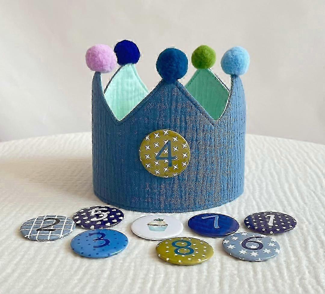 Corona di compleanno in mussola con numeri e drago di carta per bambini, realizzata in tessuto di mussola.