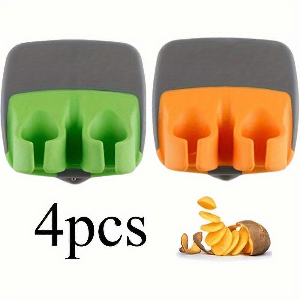 4-pakning håndskreller i rustfritt stål med fingergrep i gummi Håndskreller med lett grep for gresskar, gulrøtter, agurker, poteter