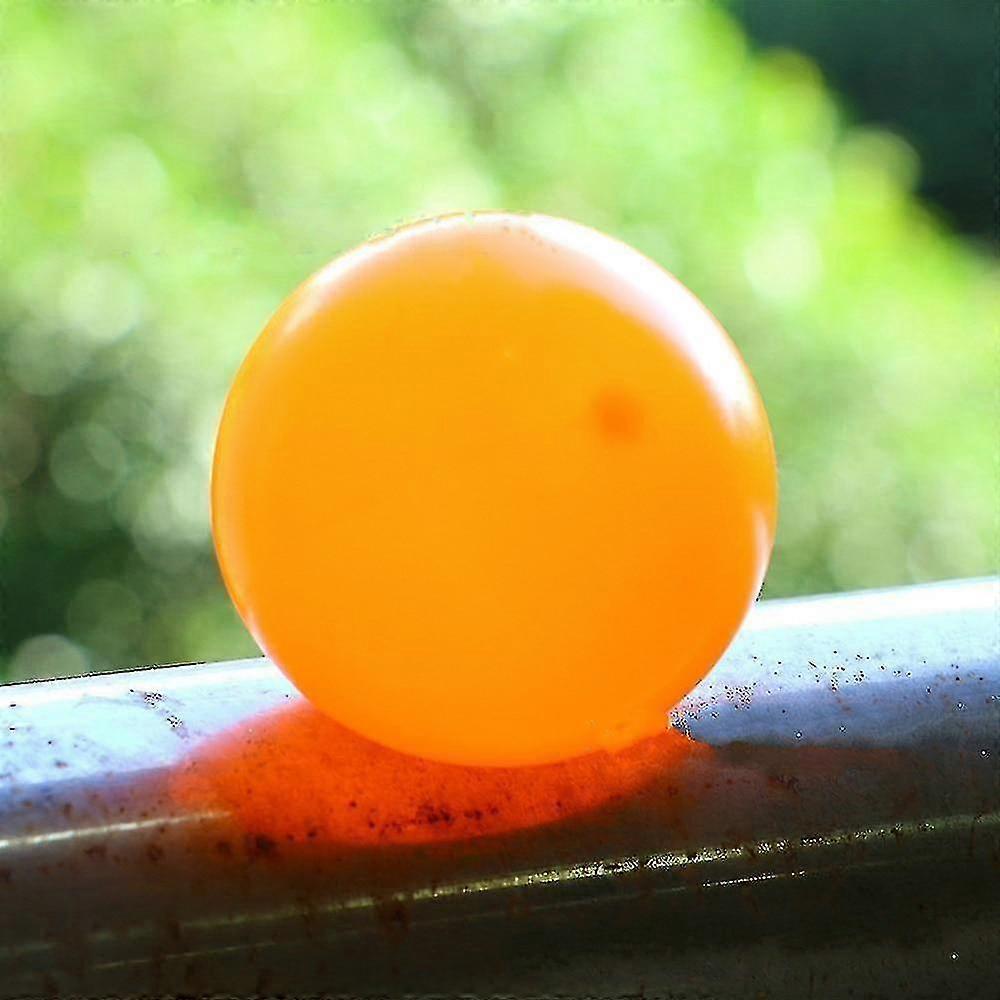 4 Piece set of 45mm luminescent sticky balls for throw at ceilings, walls and squashing for kids