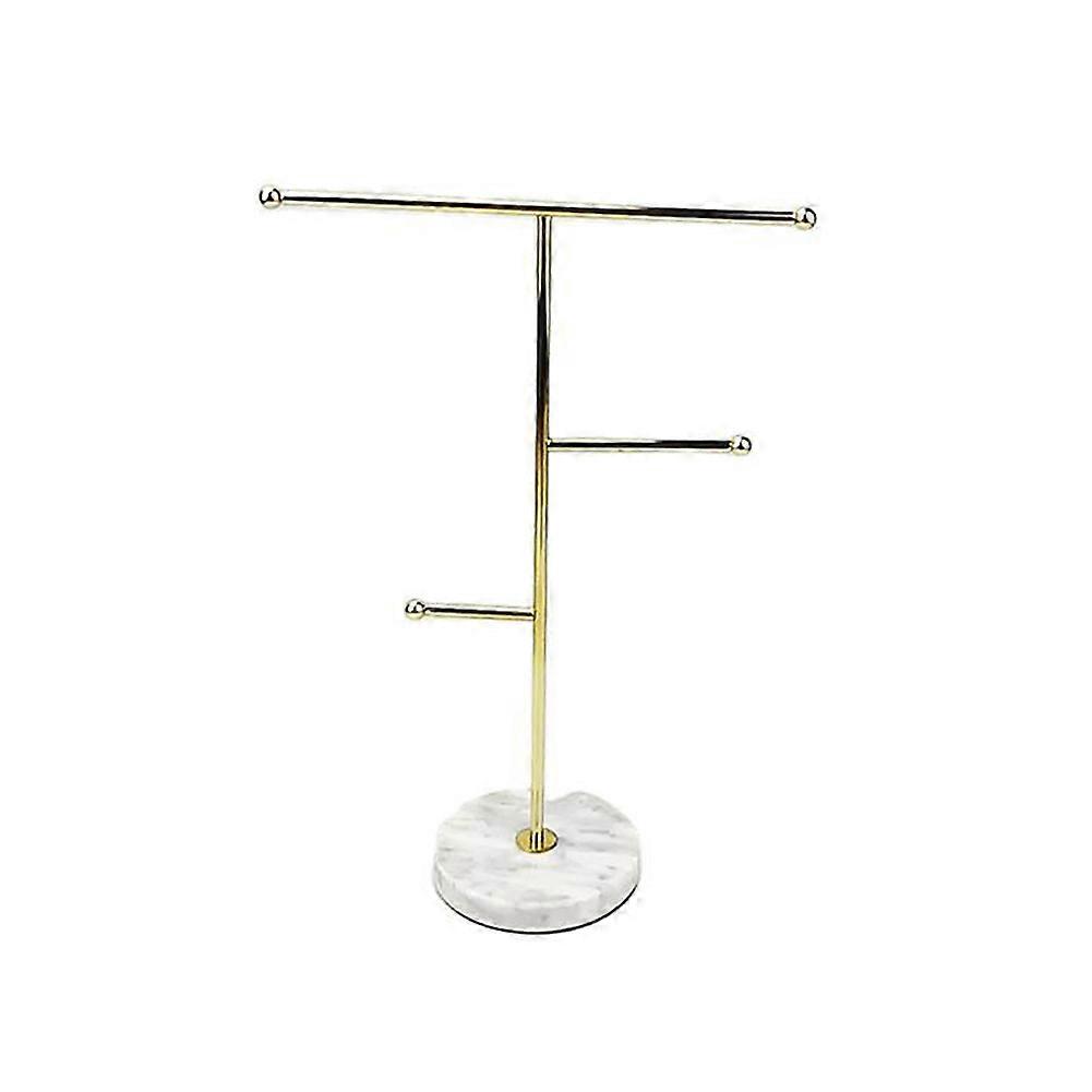 Sofistikerat smyckesställ med guldjärn och marmorbas