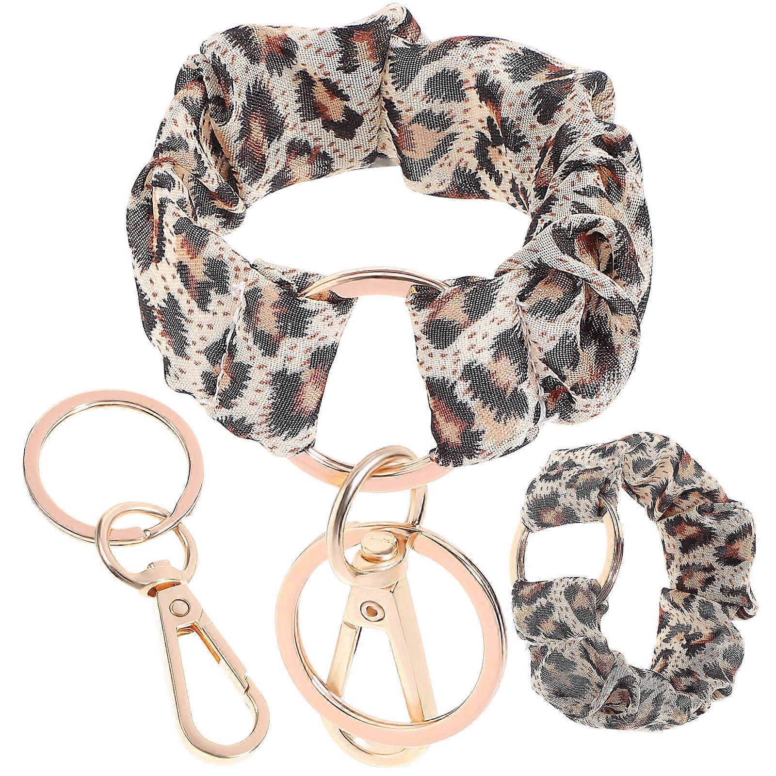 Rustfrit stål hårbånd nøglering kvinder leopard print 2stk til bærbar nøglering