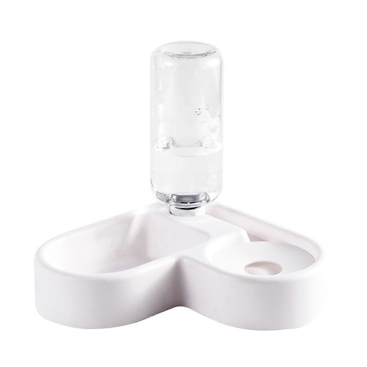 Automatic pet water and food dispenser for cats and dogs, white, nonslip design for safe eating and drinking.