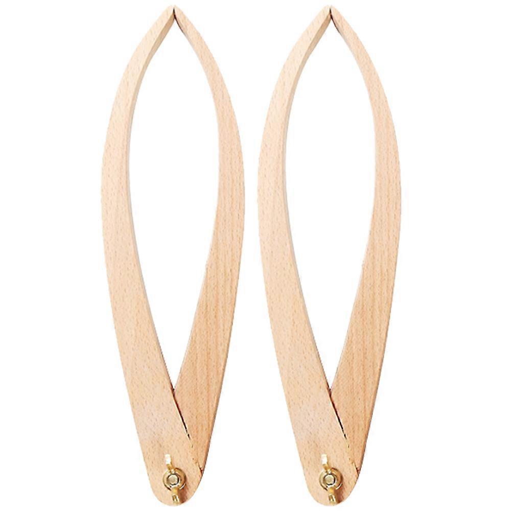 The **2pcs Wooden Outside Calipers** are a practical and traditional tool designed specifically for **pottery, sculpting, and clay crafting**. These