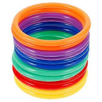 12pcs Plastic Toss Rings Juego de lanzamiento de anillos para niños para juegos al aire libre de patio trasero de jardín de carnaval (color aleatorio)