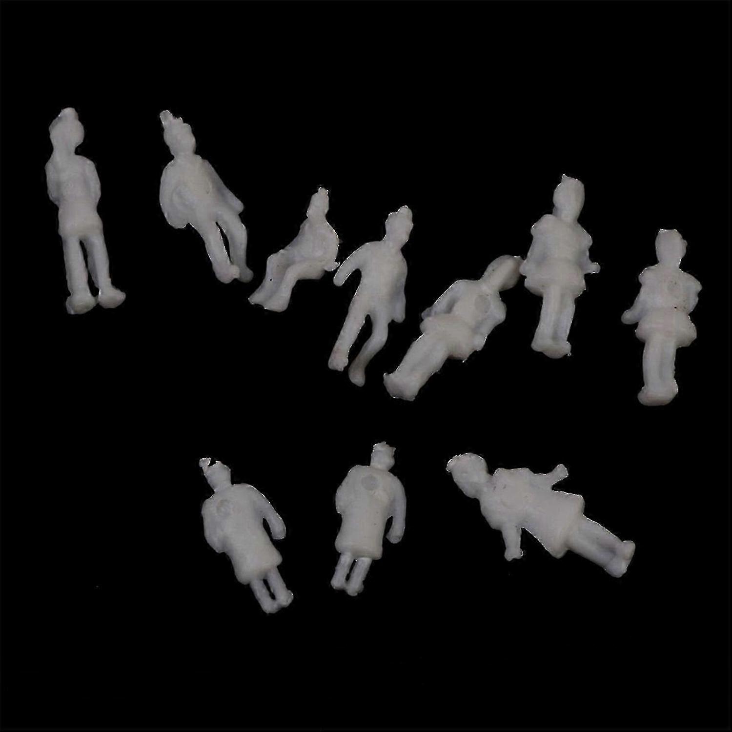Model figures, 1:200 scale, 100 pieces per pack, white.