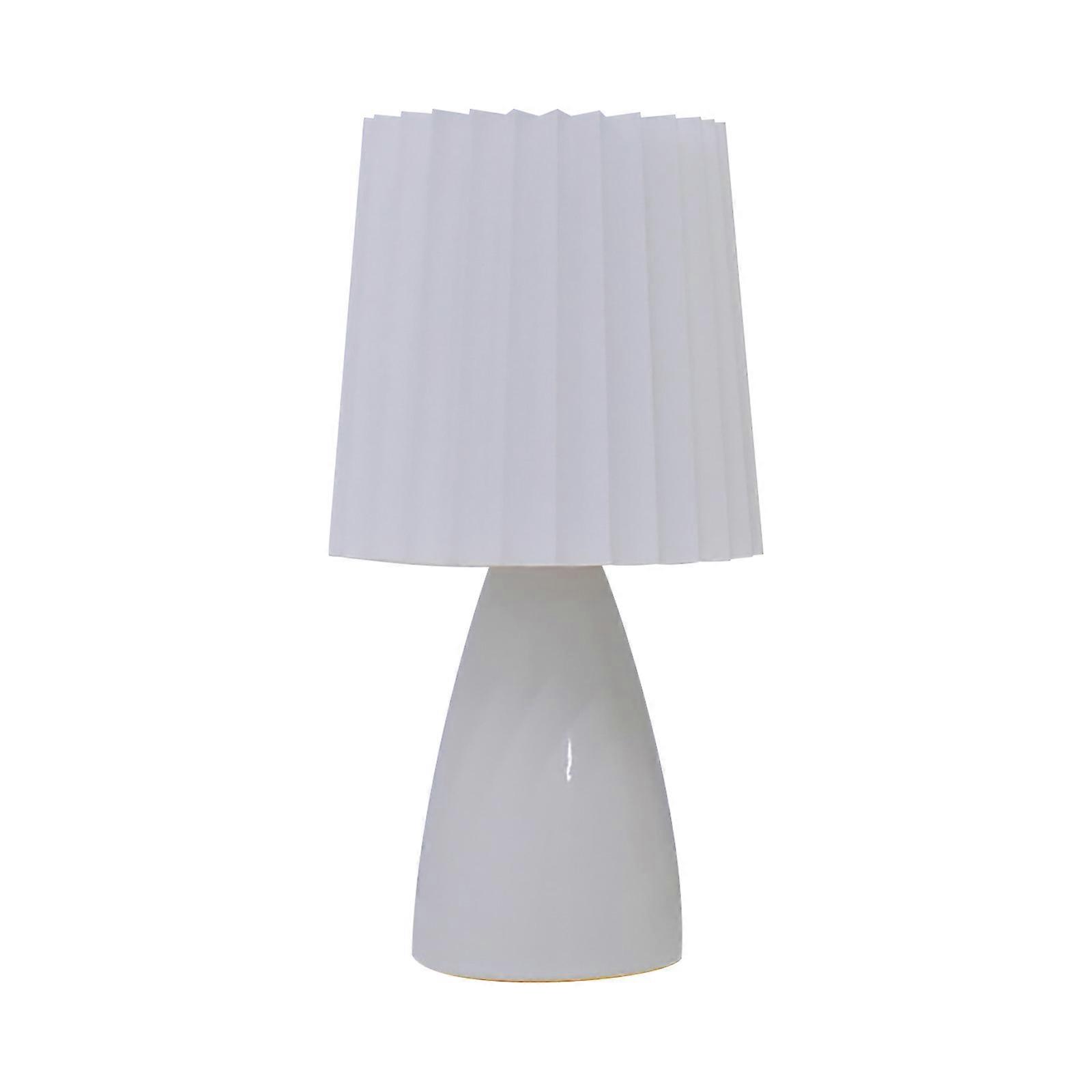 Luz nocturna de control táctil junto a la cama