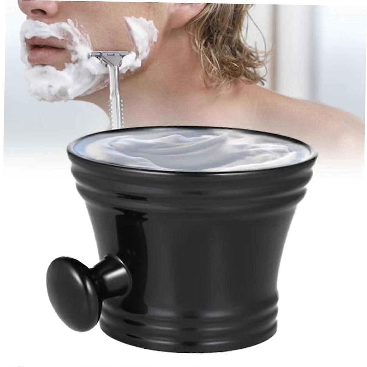Black plastic shaving soap bowl with round handle for men's facial care, portable shaving mug for traditional, durable, and elegant use.