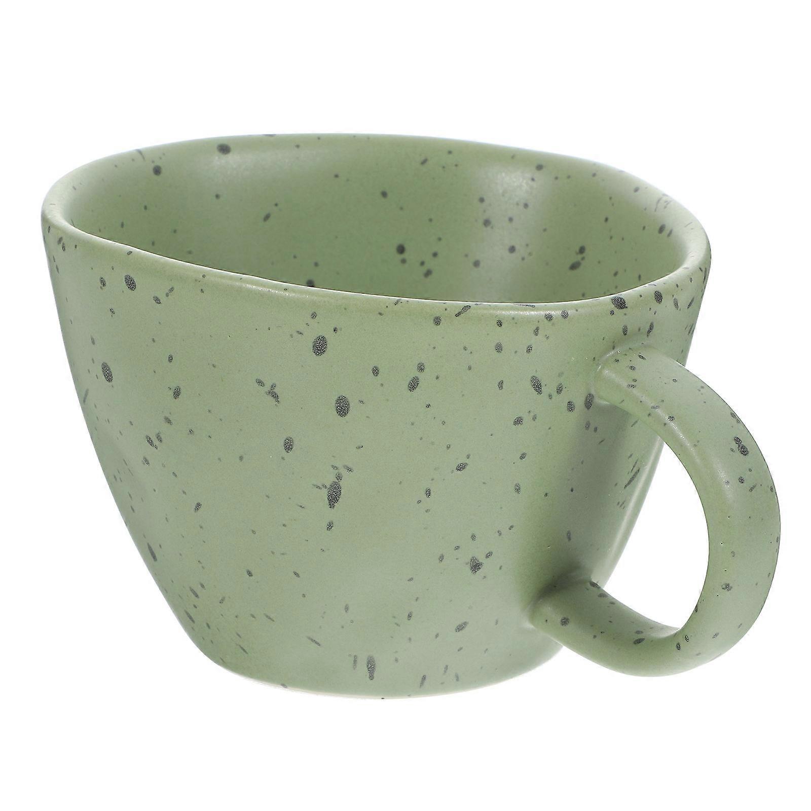 Here's a polished and professional product description based on your input:
**Multifunctional Ceramic Cup – Stylish Ink Splash Design | Dark