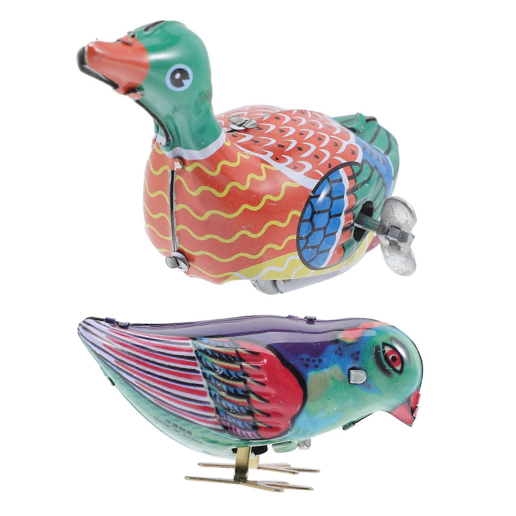 Collectible windup toys for boys and girls, 2piece tin toys in magpie design, handeye coordination.
