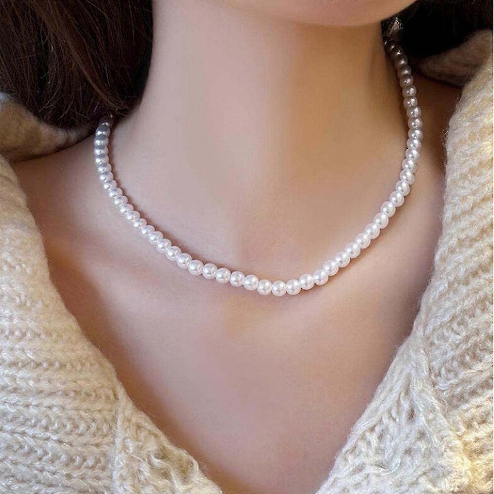 This necklace is very elegant. Its delicate, sparkling shine and classic design make it versatile and it pairs well with shirts and dresses.