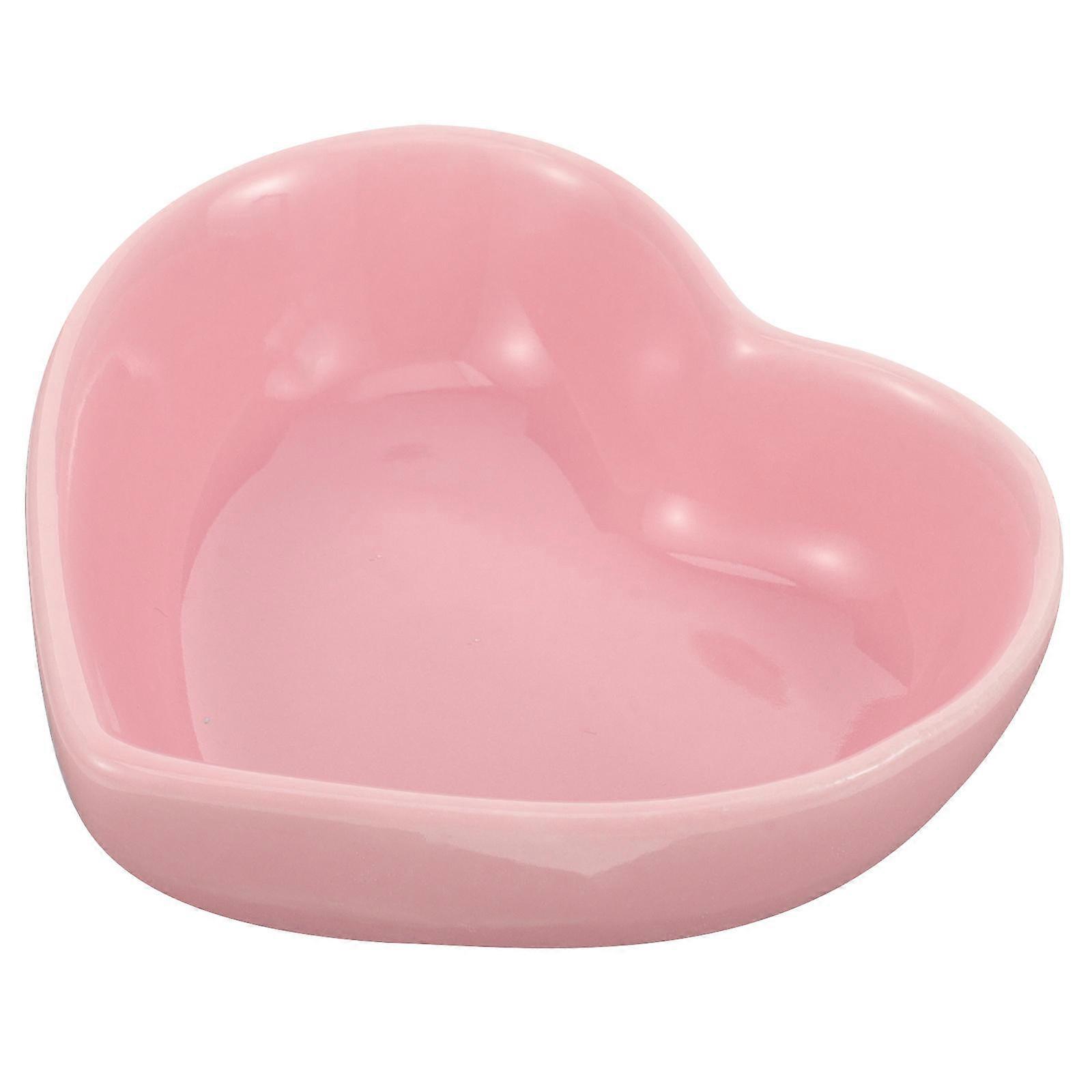 Here's a polished product description for your **Heart Shaped Ceramic Pet Bowl**:
### 🐹❤️ **Heart Shaped Ceramic Pet Bowl – Non Tip Design for