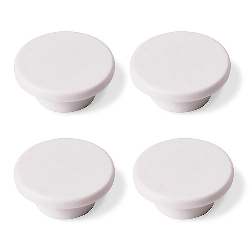 A set of 4 colorful plastic furniture handles, round drawer handles, available in 6 colors, perfect for children's room furniture.