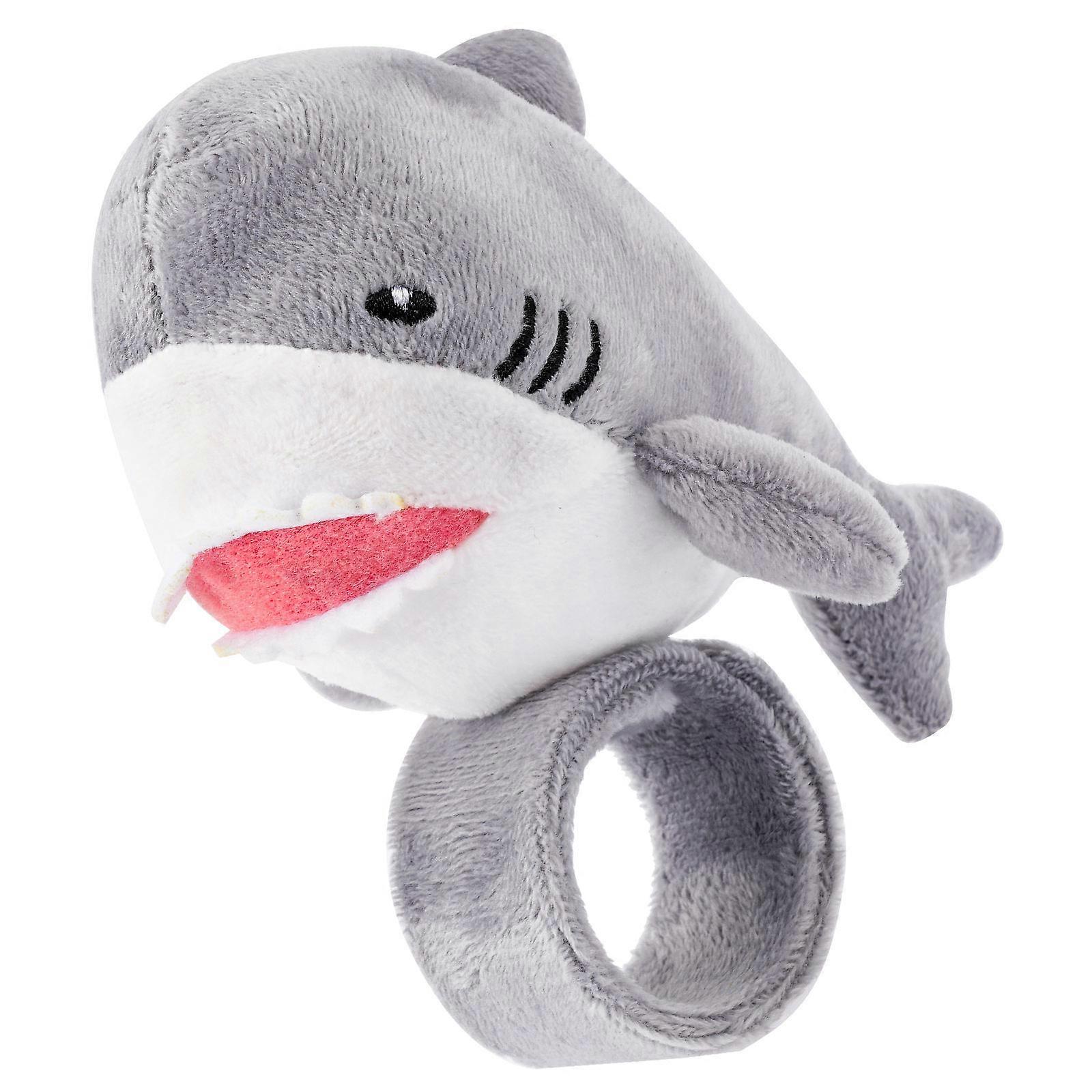 It looks like you're referring to a product description for a **shark themed stuffed animal slap bracelet**. These are popular as **party favors**,