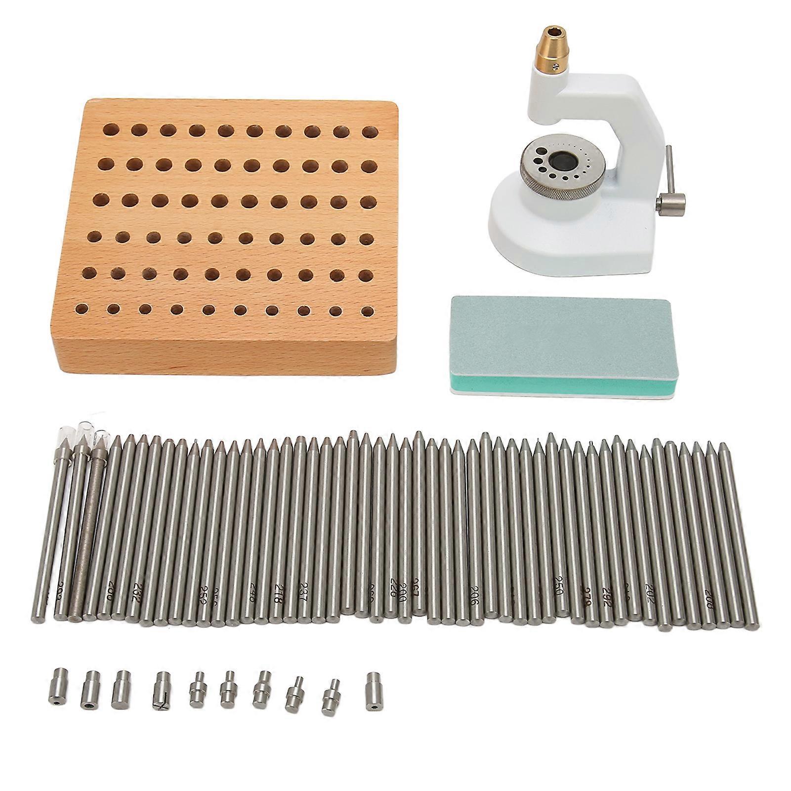 Watchmaker's punching kit with 50 punches and 10 pegs