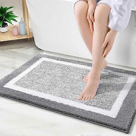 Non-slip microfiber bath mat for bathroom. Extra soft. Absorbent. Machine washable. Quick drying. 40 x 60 cm