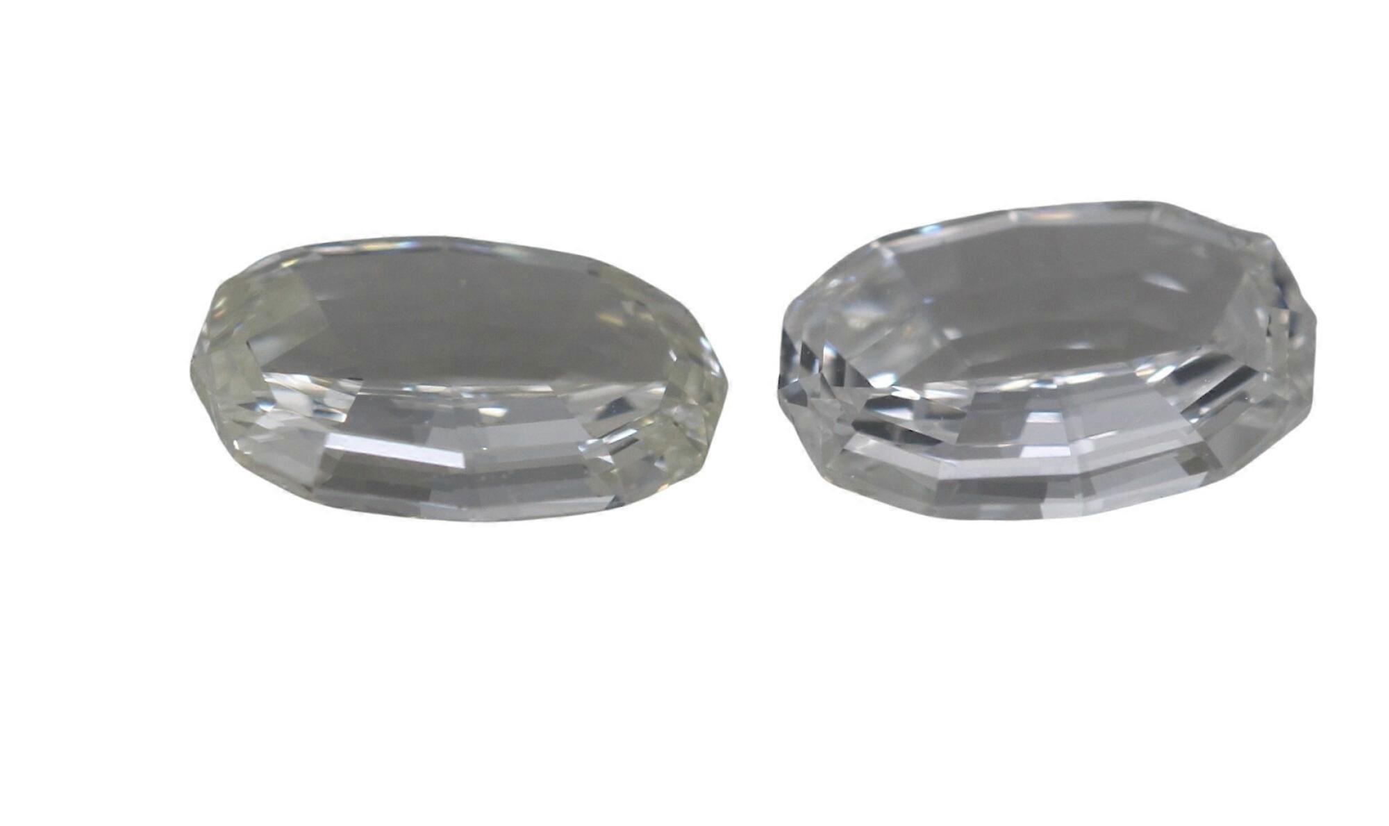 A Pair of Oval Step Cut Natural Mined Loose Diamonds (1.35 Ct,H Color,VVS2 Clarity)