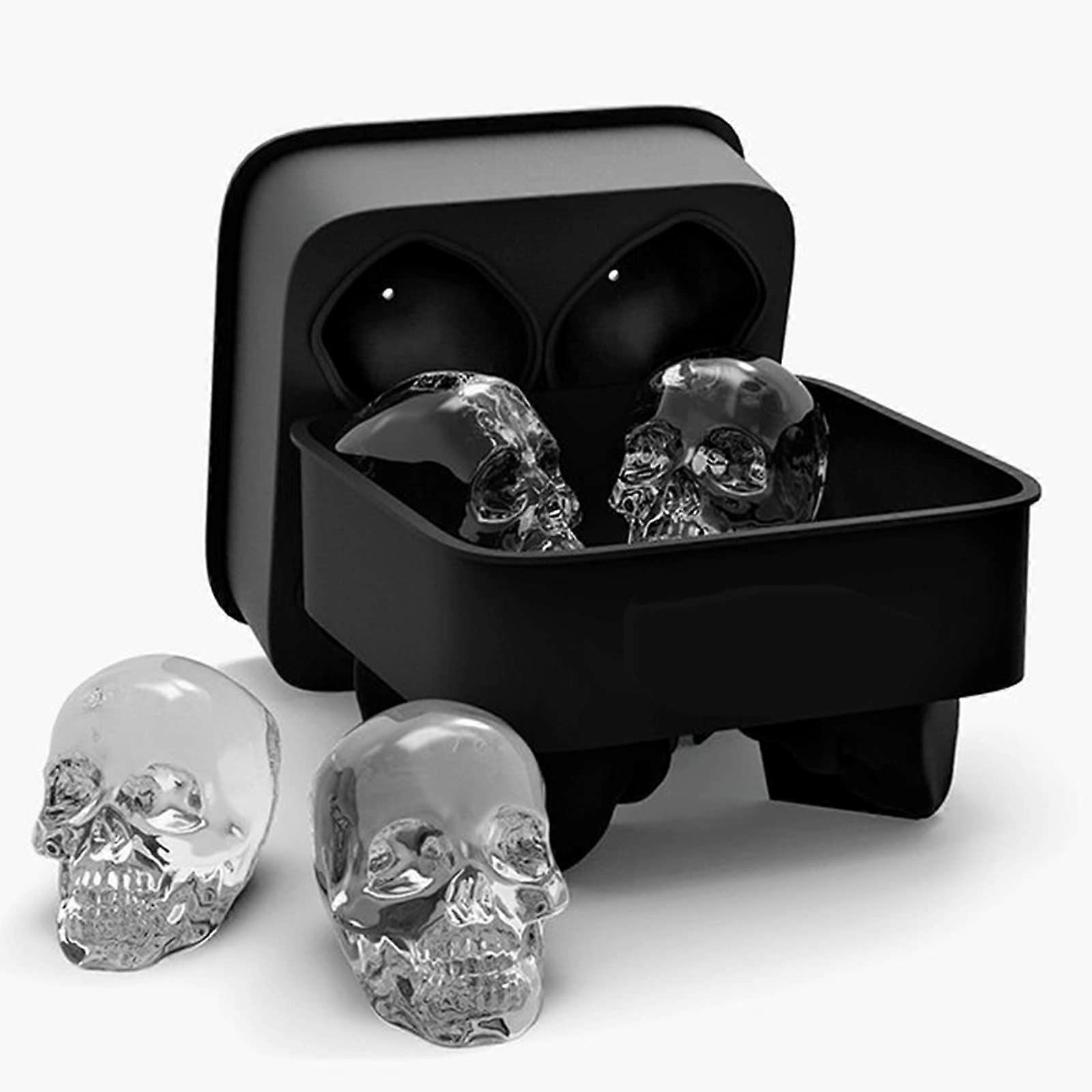 The 3D skull shaped silicone ice cube mould tray with lid makes 4 vivid skulls, perfect for any drink.
