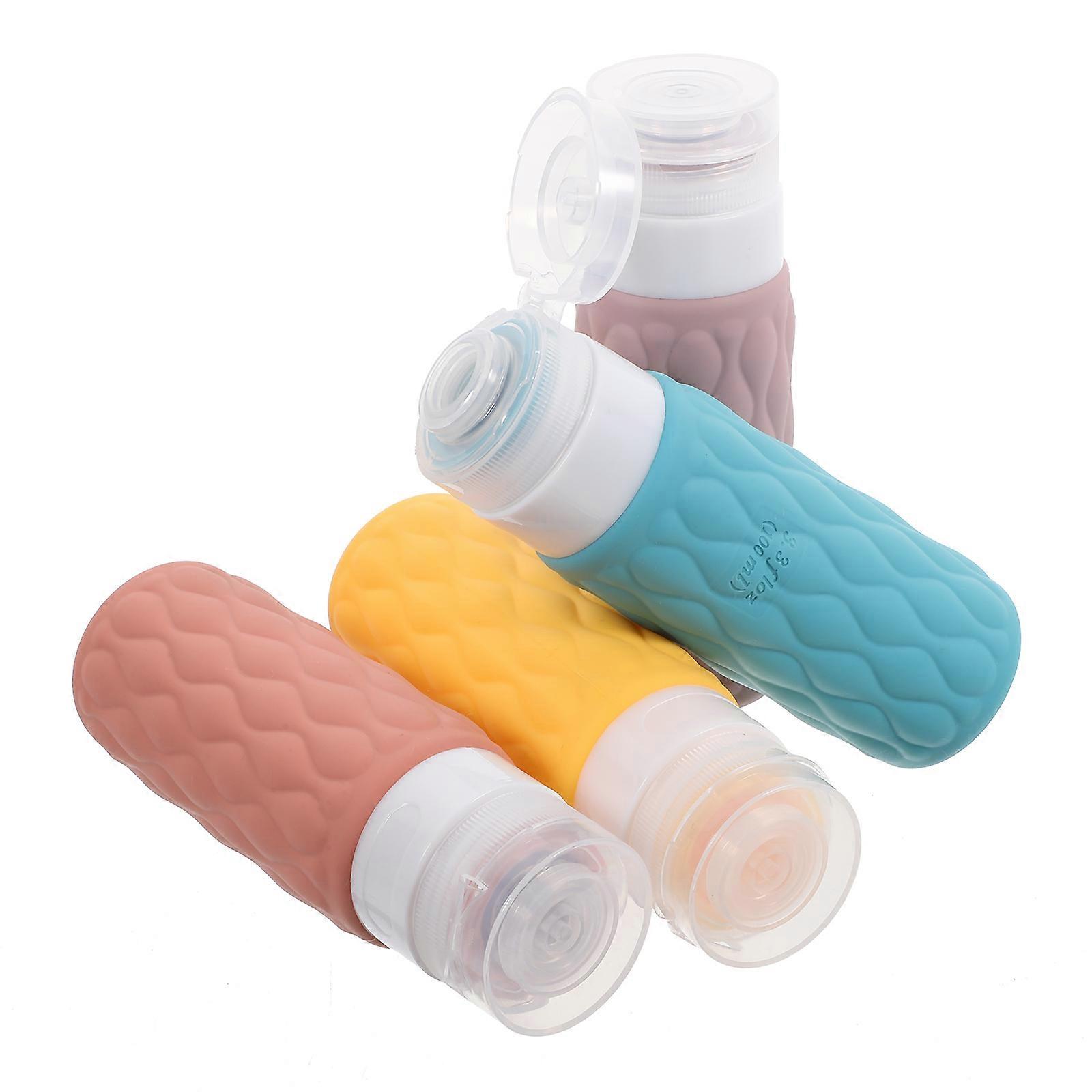 4pcs Silicone Travel Shampoo Bottles with Storage Bag – Refillable, Leakproof Squeeze Dispenser for Toiletries – Easy to Use, Blossom Pink, Grape