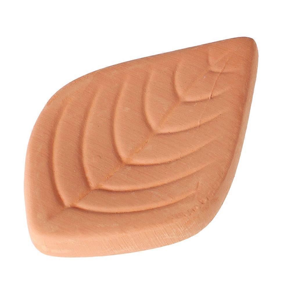 The **Terracotta Brown Sugar Softener Reusable Leaf Shaped Sugar Saver** is a practical and kitchen tool designed to keep brown sugar soft and