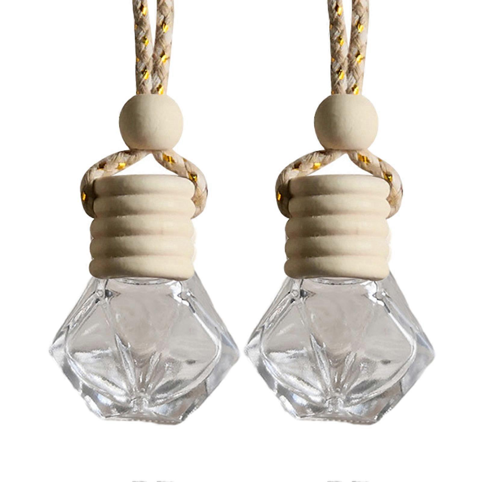 Hanging Car Perfume Diffuser with Creative Bottle Pendant Design