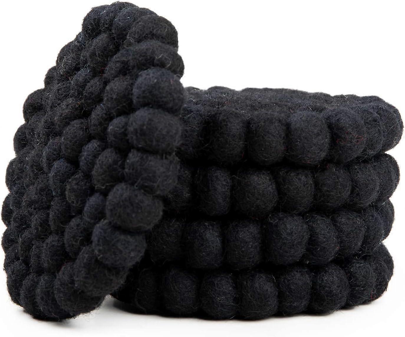 Round, absorbent felt ball coaster