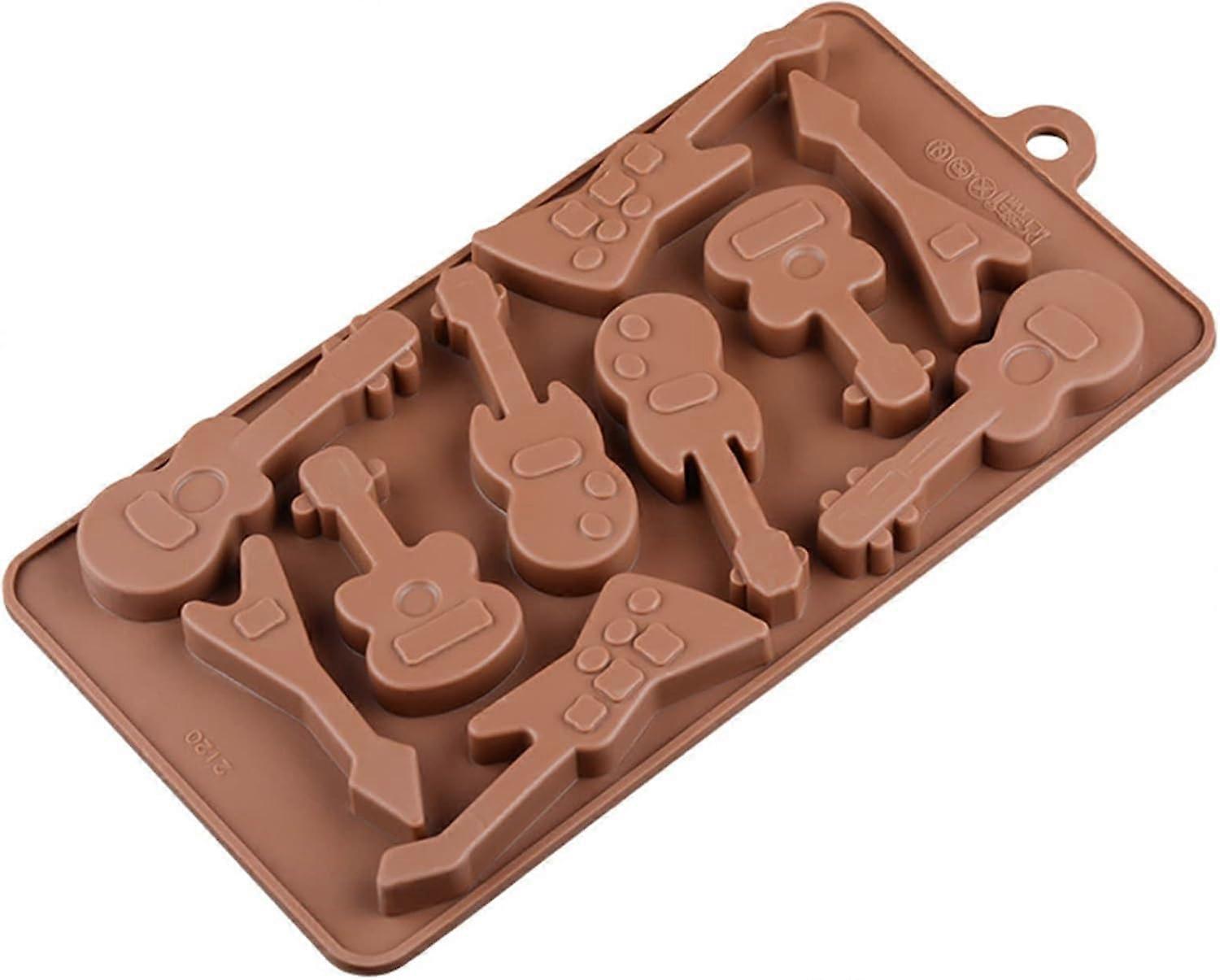 Various guitar-shaped chocolate molds, 10 cavities