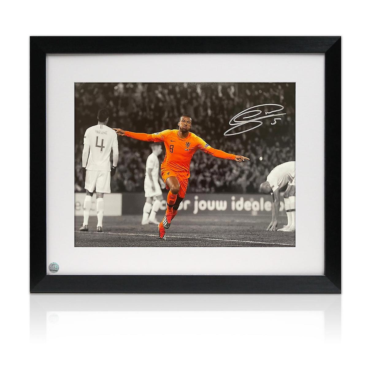 Georginio Wijnaldum 在 Holland Football 照片上签名。陷害