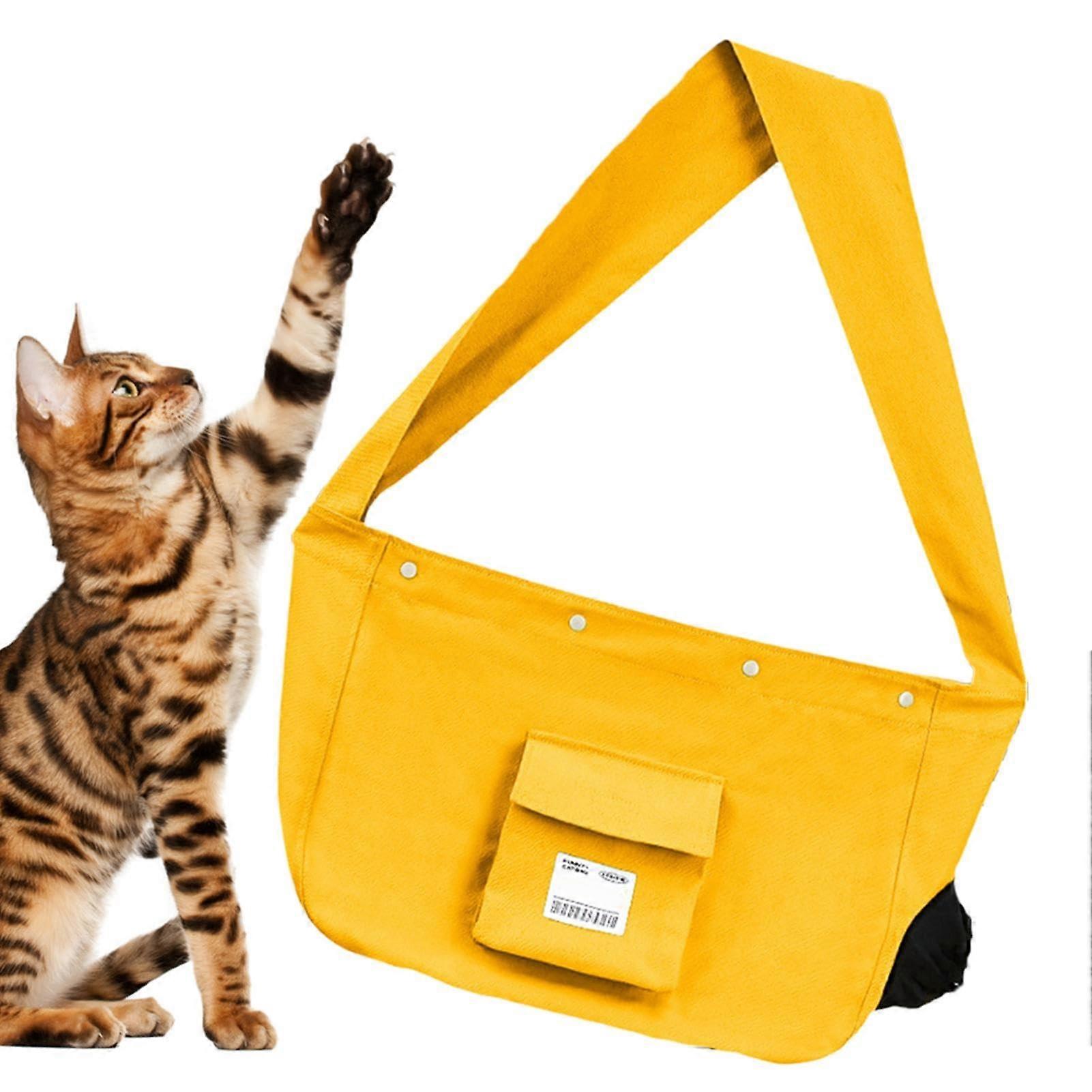 Portable cat carrier with sling design for travel, yellow.