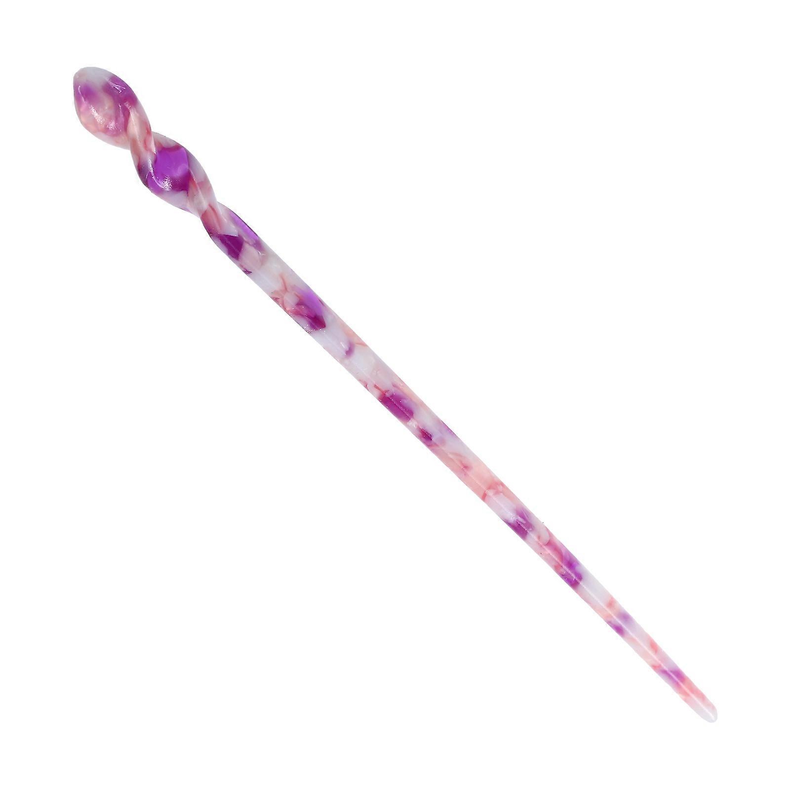 Grampo de cabelo roxo, resistente e bem-feito.