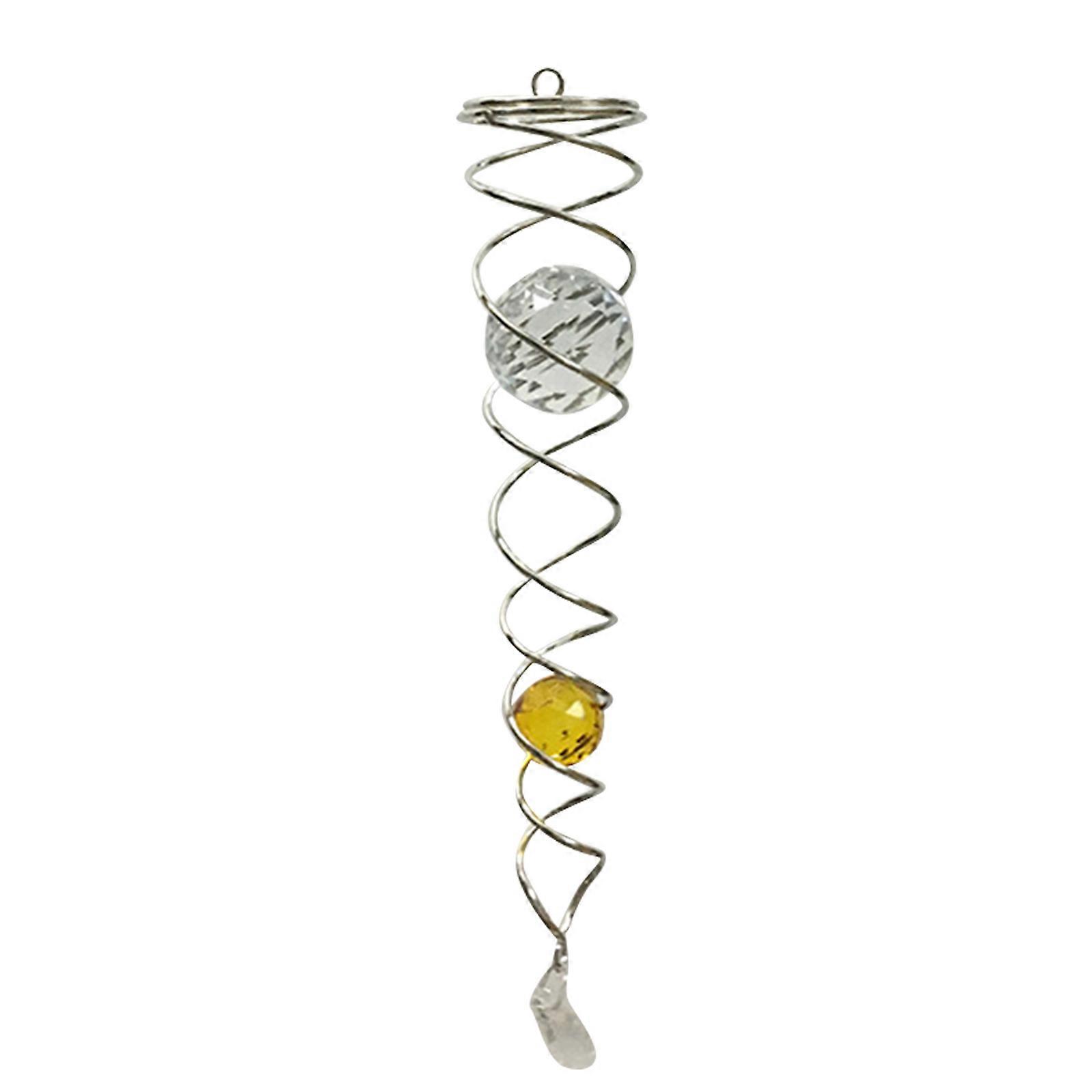 Souffleuse jaune avec queue en spirale et boule de cristal