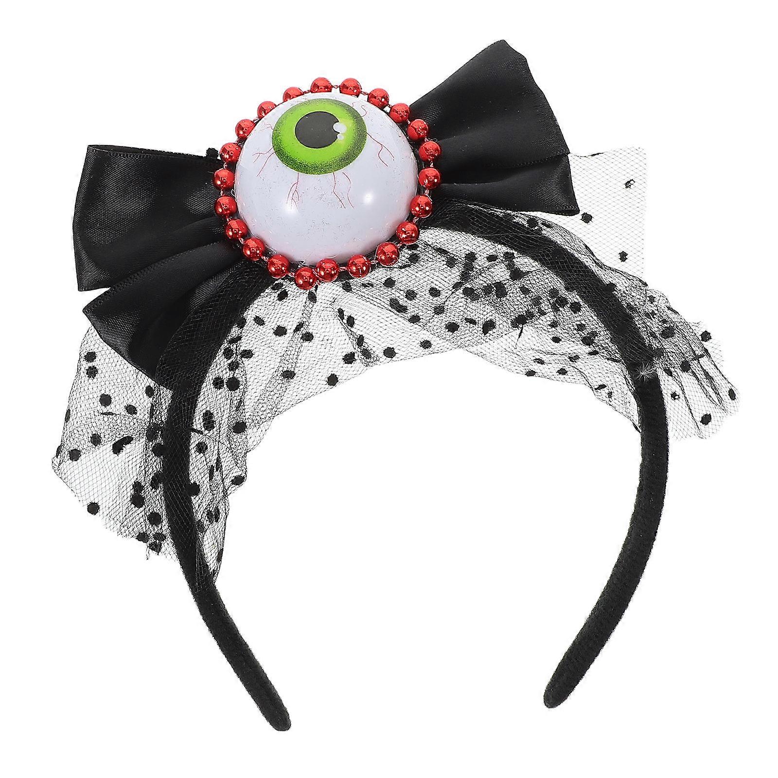 The **Halloween Bowknot Eyeball Headband** is a fun and spooky hair accessory perfect for adding a touch of eerie charm to your Halloween costume or