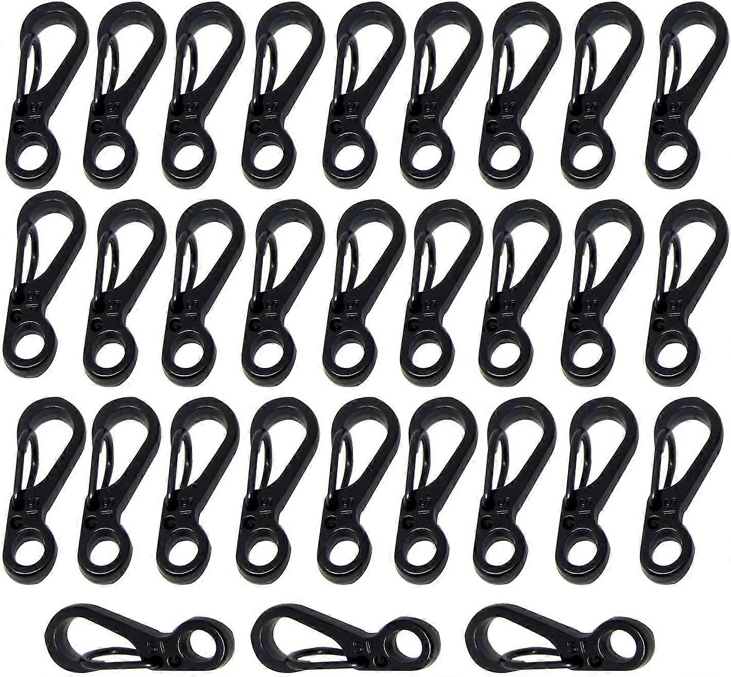 Set of 30 mini carabiners with metal spring hook and small hole for key ring clasps.