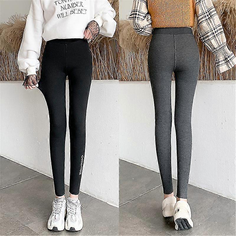 女性のレギンスは暖かいハイウエストの渦巻き文字冬の厚いフリースレギンスを保ちます