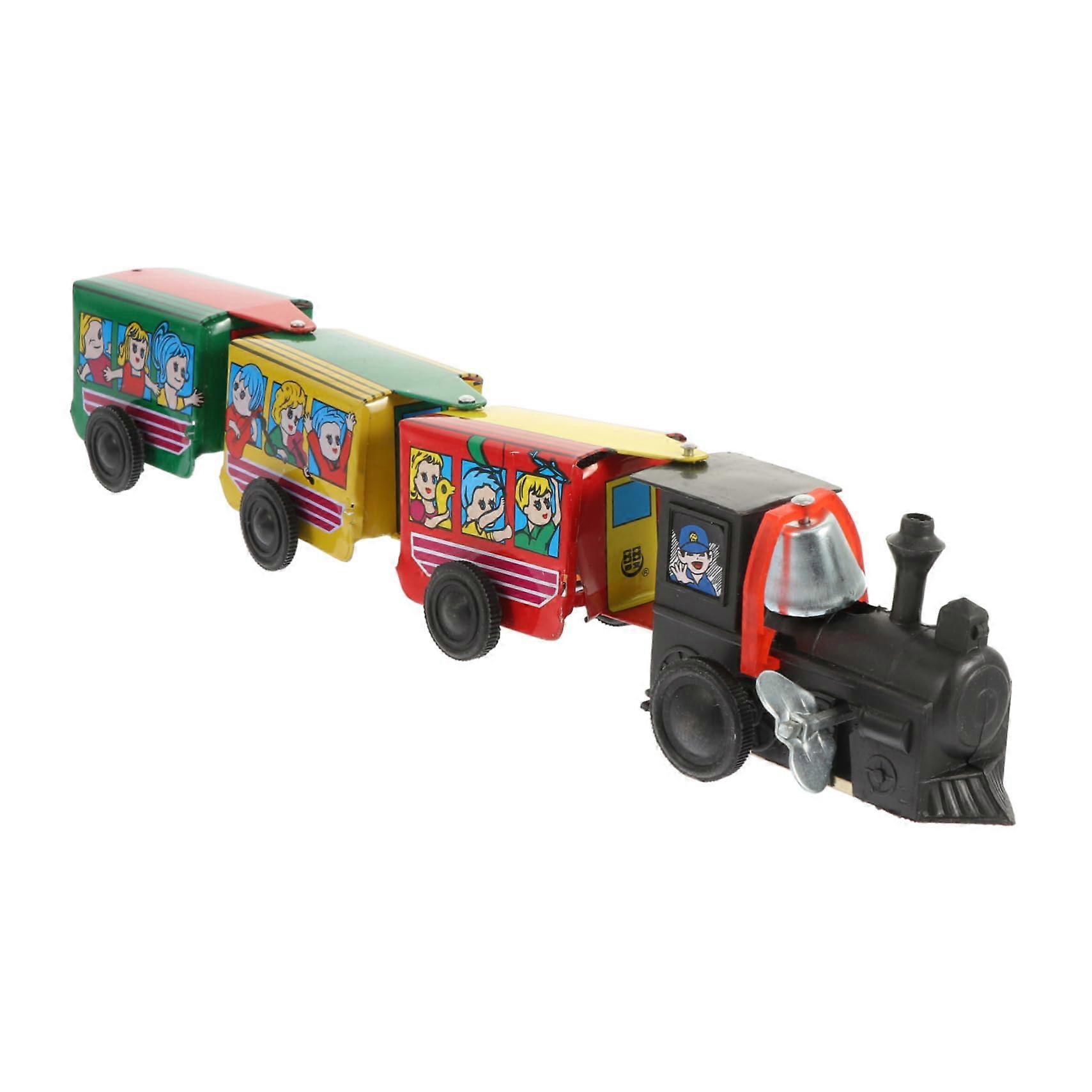 Windup toy train for retro toy railway with wagons. Mechanical design, energyefficient, colorful, and safe for boys and girls.