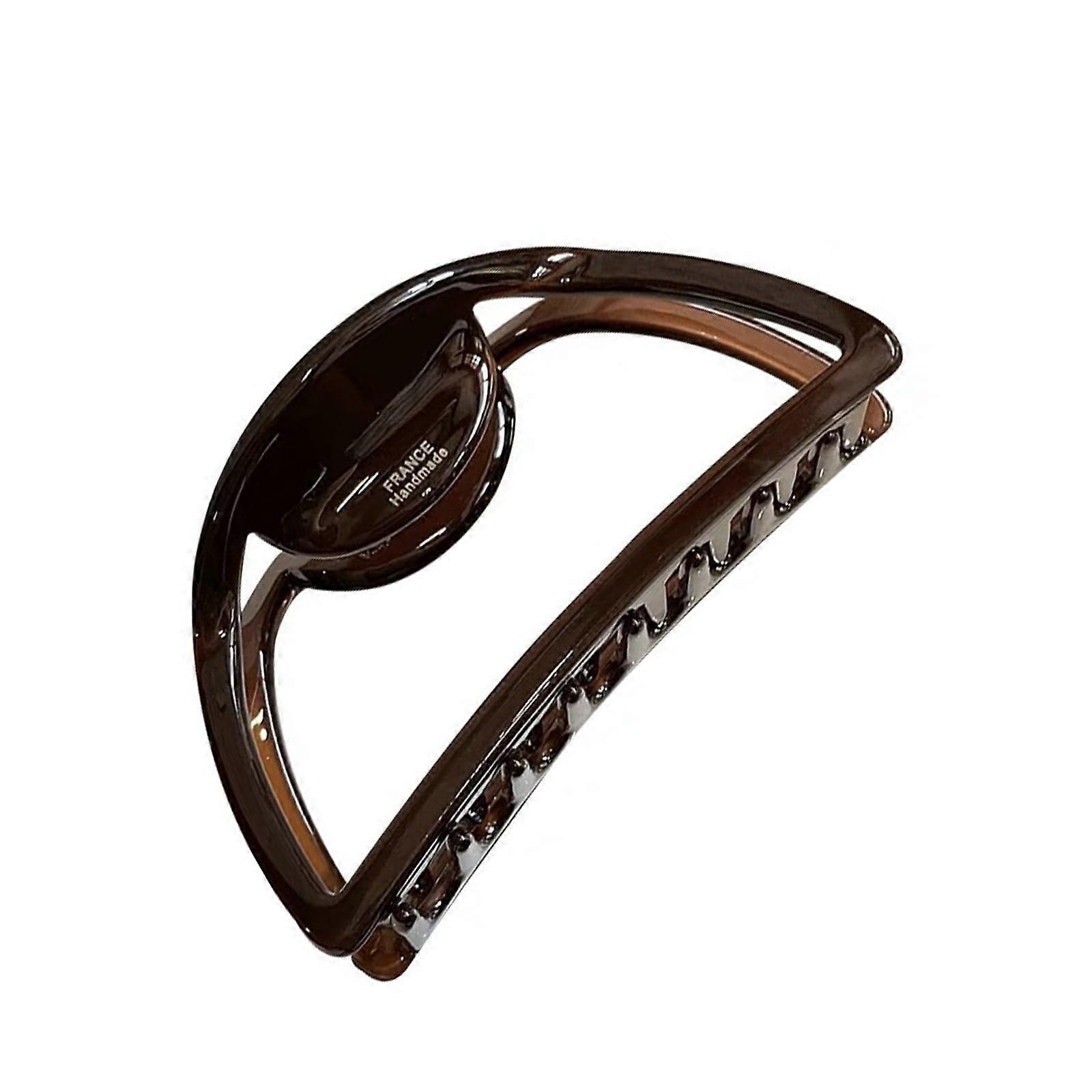Large, stylish acetate hair clip with a strong grip, suitable for both children and adults.
