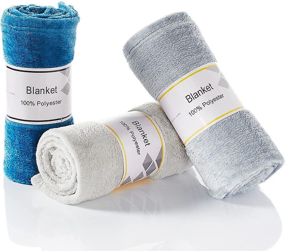 Penguin Home® Dual Sided Solid Flannel Throw Blankets