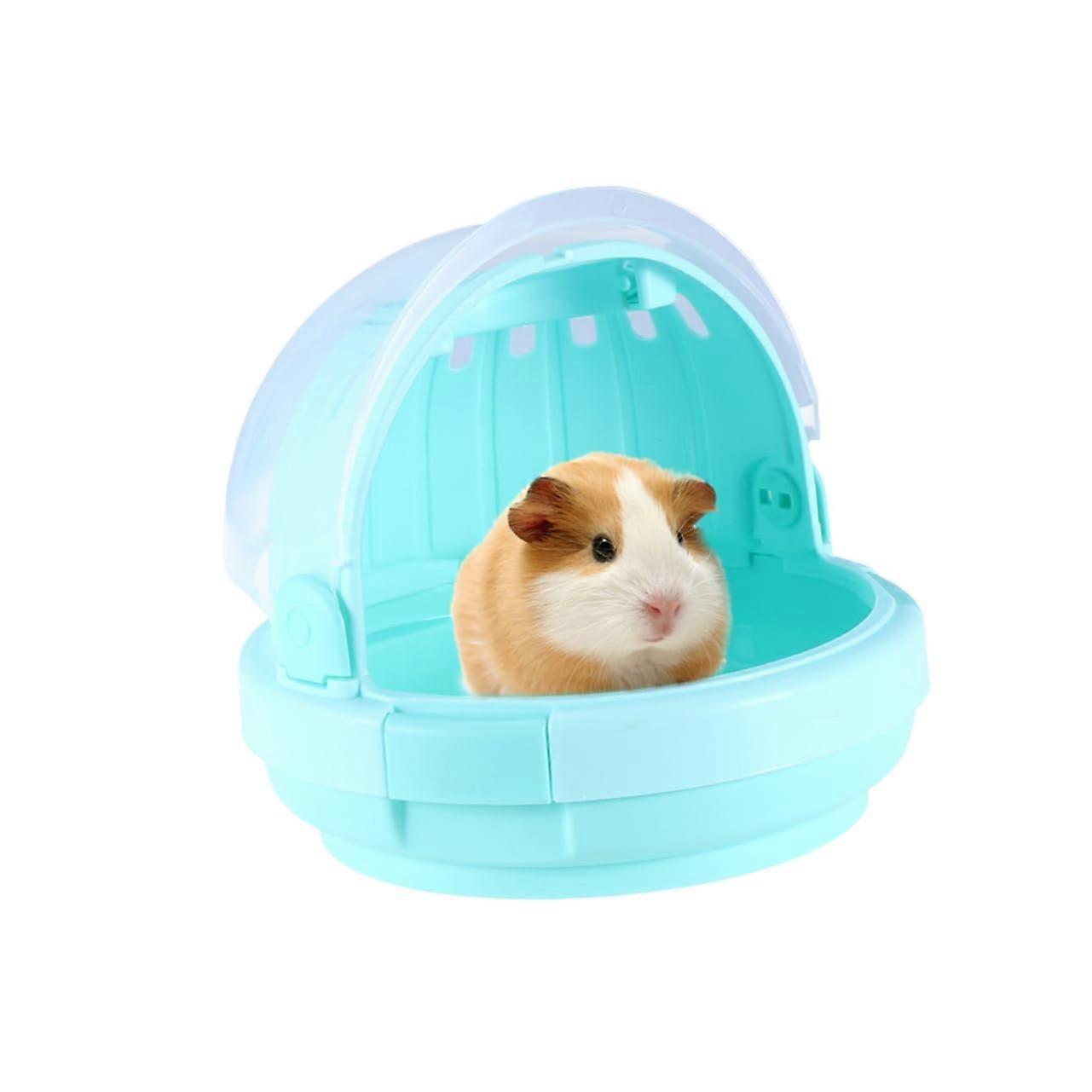 Portable hamster transport cage made of plastic with secure locking system and ventilation openings for short trips with small animals, green.