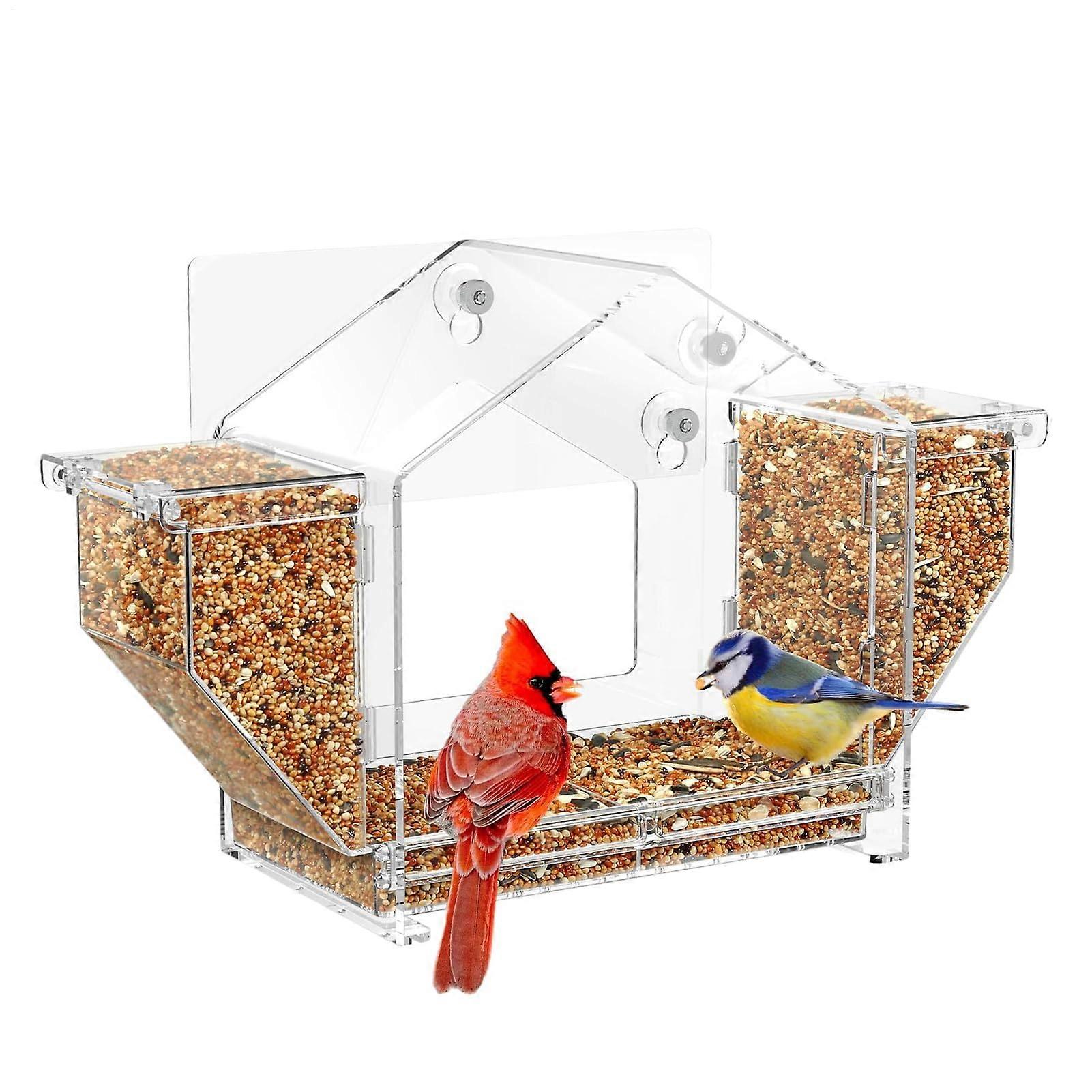 Windowmounted bird feeder station, transparent, squirrelproof design, removable seed tray