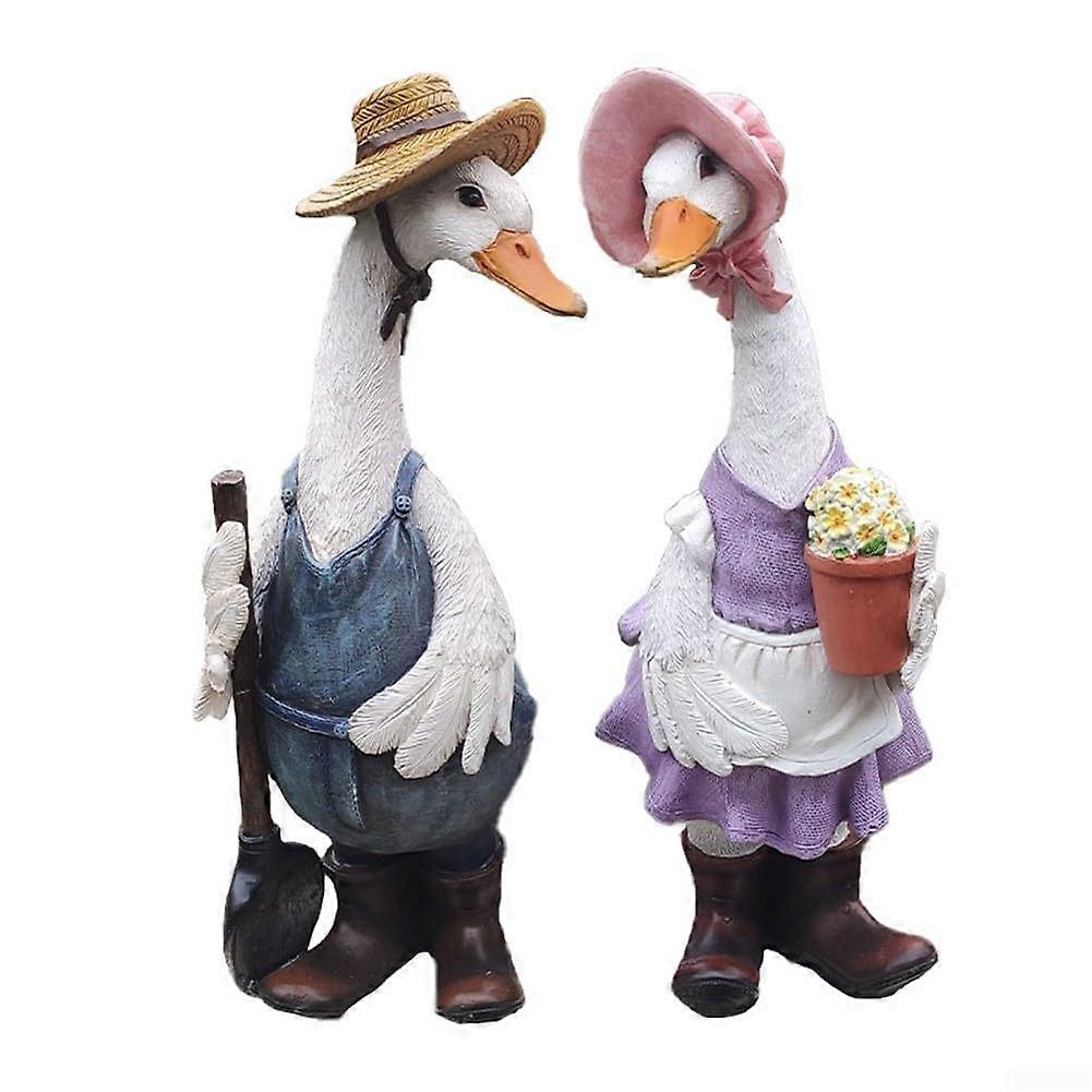 Cute Decorative Garden Ducks Made of Weatherproof Materials (Ducks with Scoops)