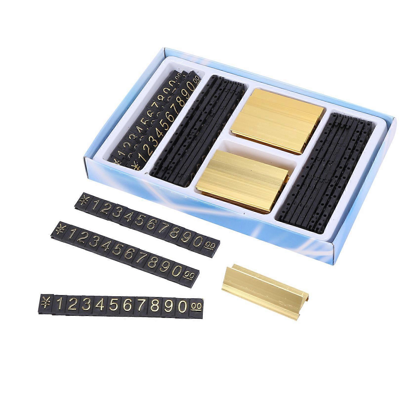 19 gruppi di metallo color oro, etichette con numeri arabi