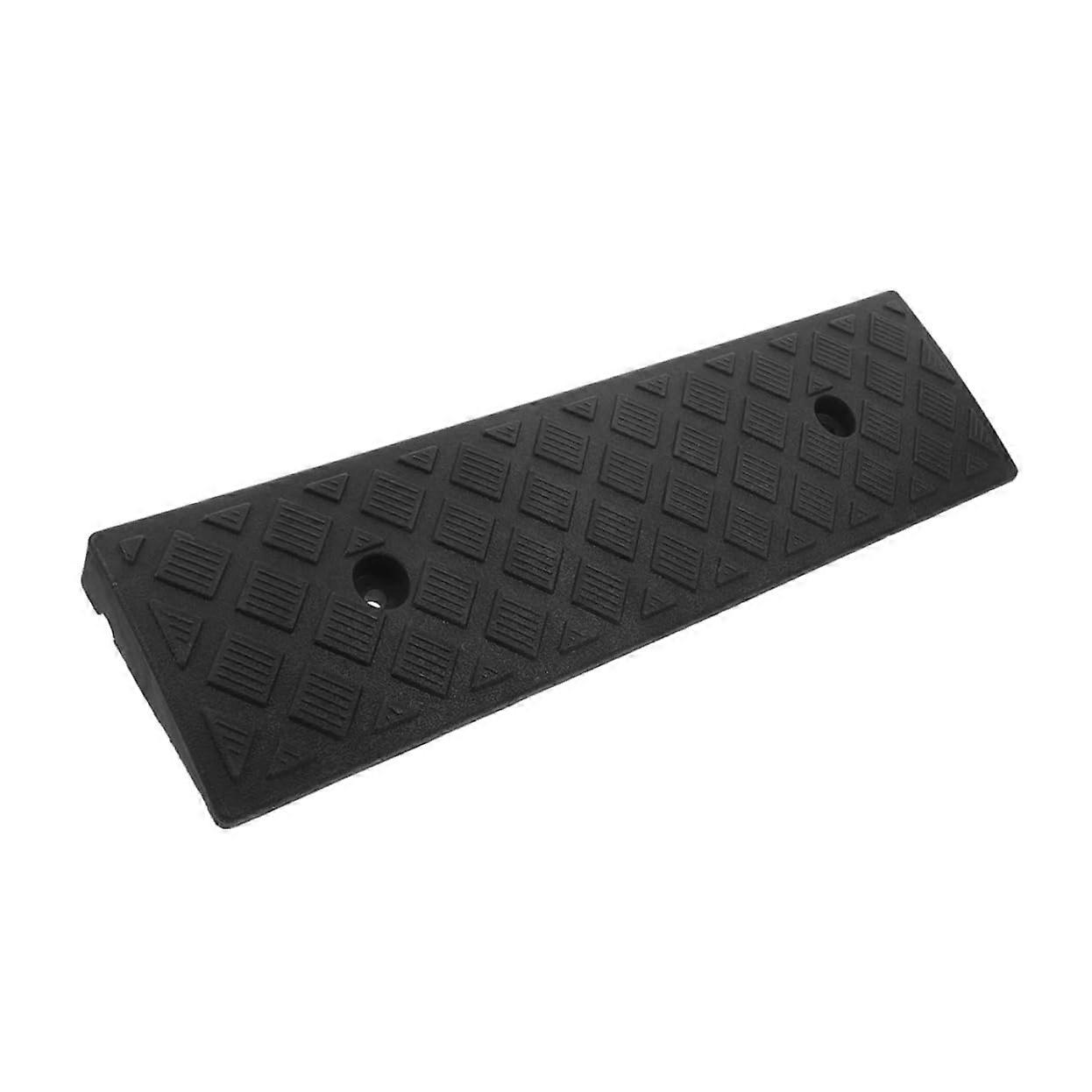 Robust plastic curb ramp for cars and wheelchairs with nonslip surface for indoor steps and sidewalks.