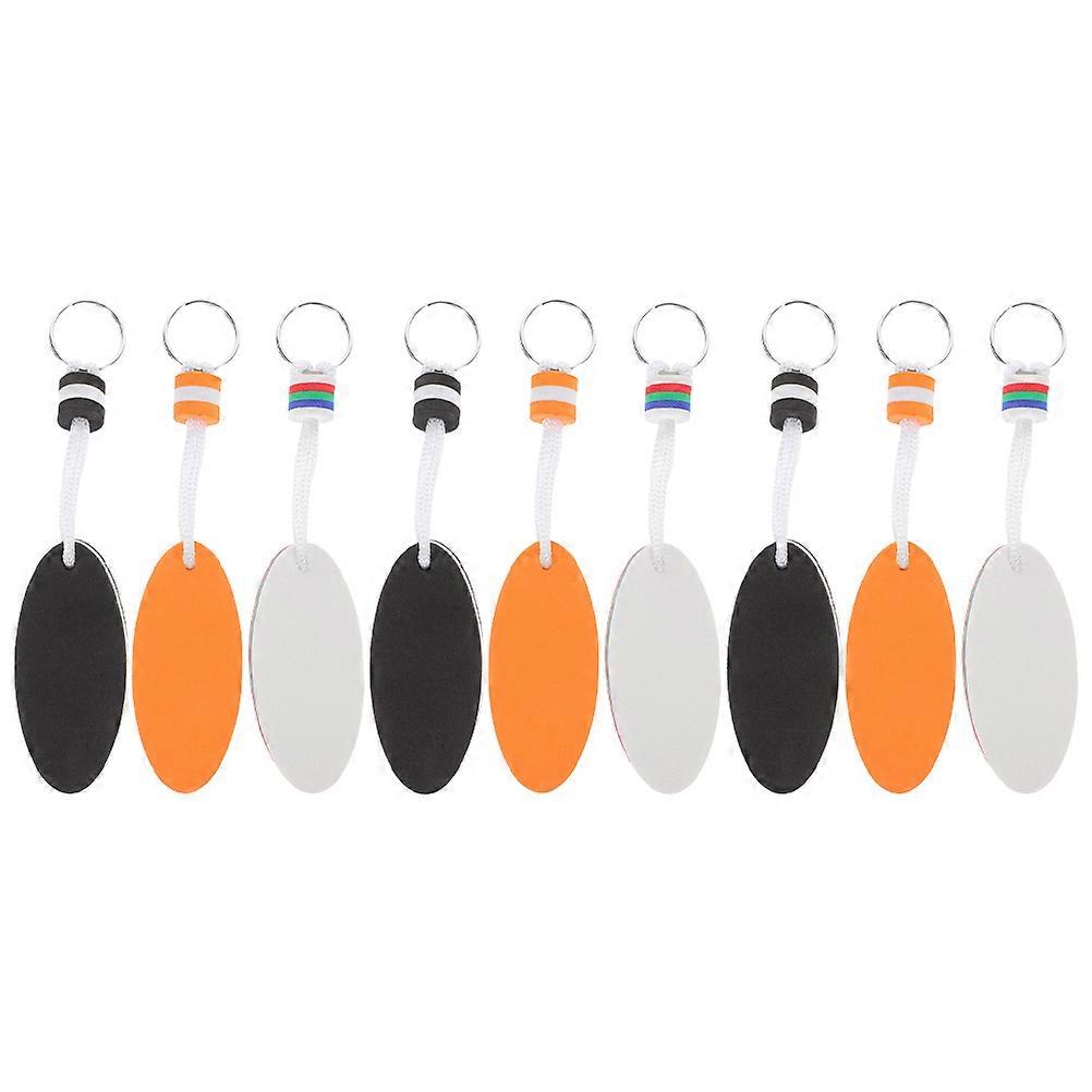 9pcs Floating Keychains for Water Sports   Lightweight Oval Key Rings in Orange, White, and Black for Boating, Fishing, Rafting, and Sailing