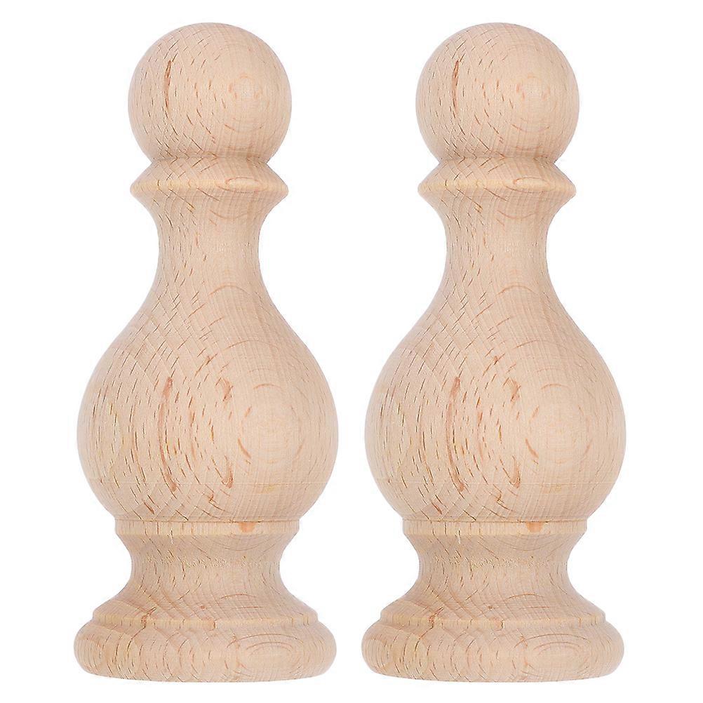 It sounds like you're describing a product listing for **unfinished wood finials**. These are versatile decorative pieces commonly used in DIY