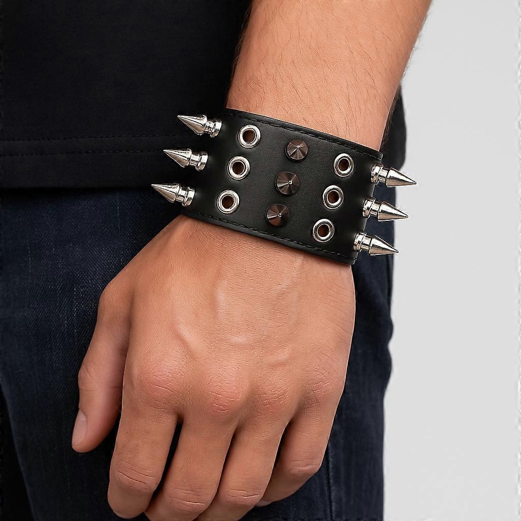 Wide black leather rivet bracelet with three rows of conical spikes