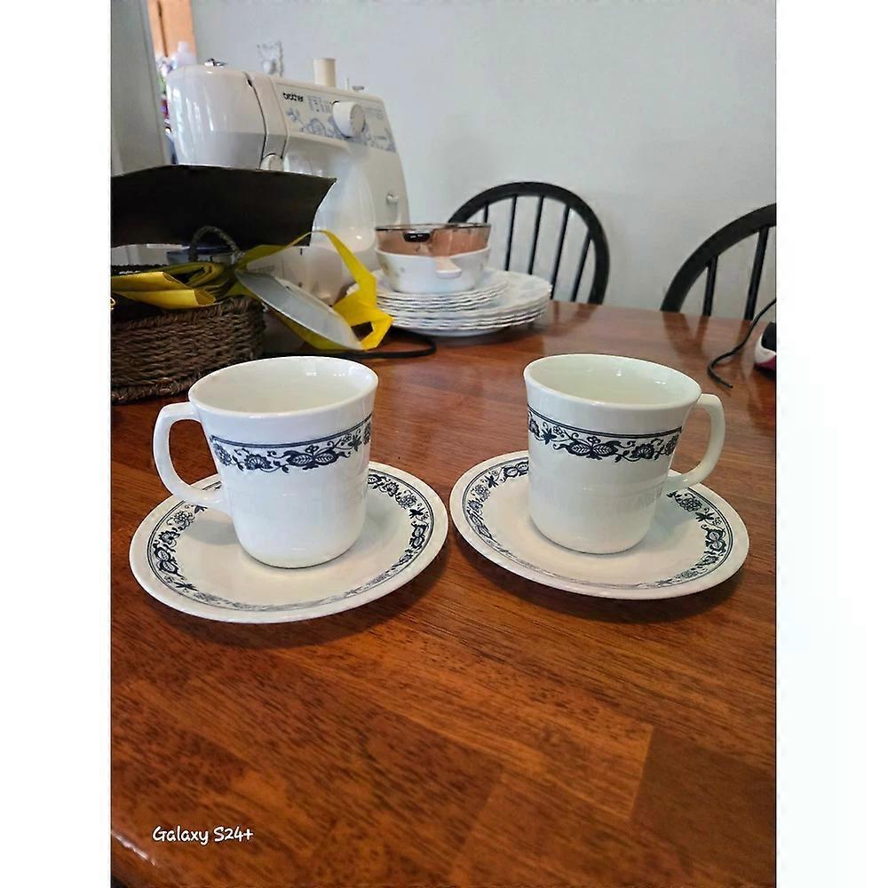 Olde time pattern cups and saucers. 2 Each.
