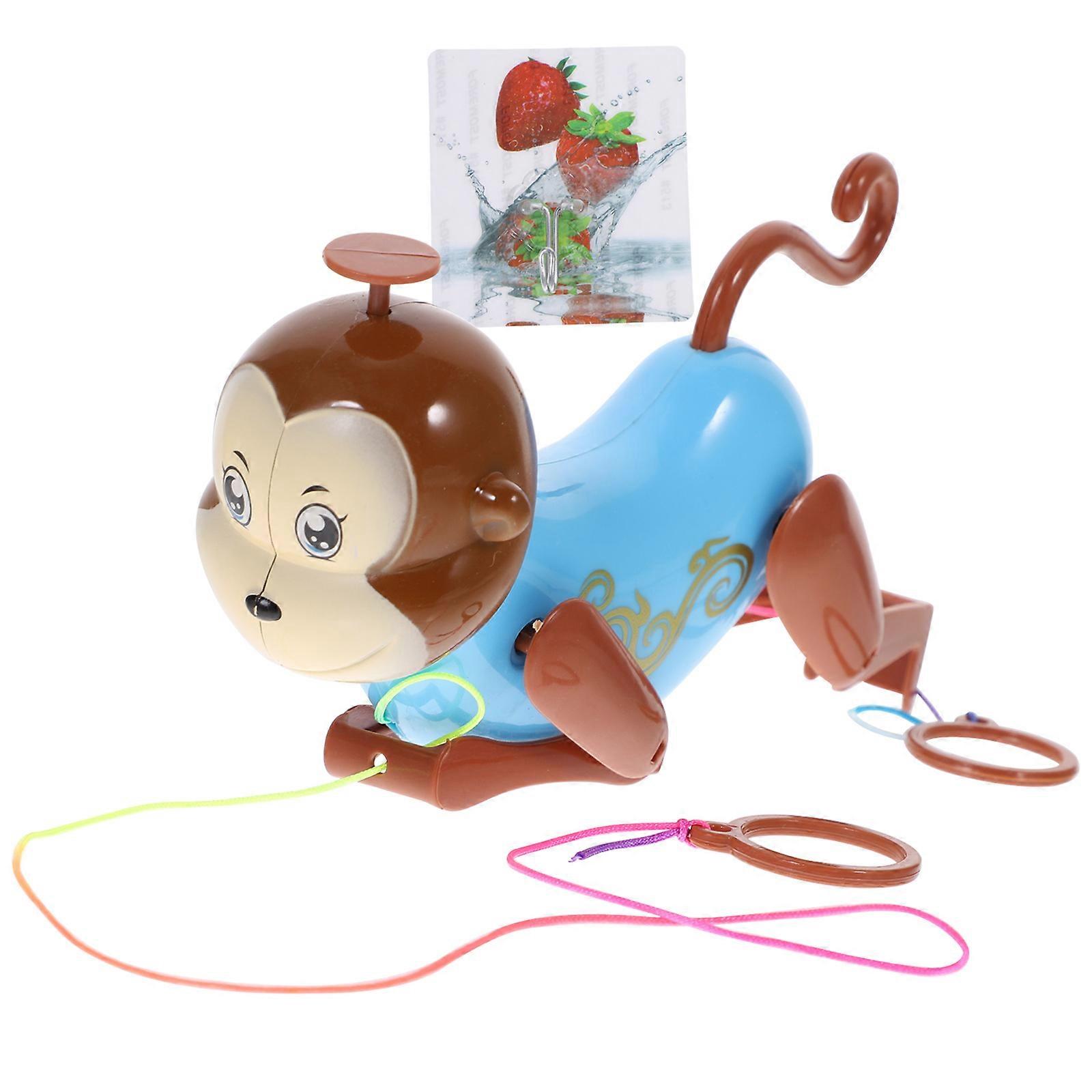Jouet d’escalade de singe en plastique Enfants Tirant Corde Jouet (Couleur Aléatoire)