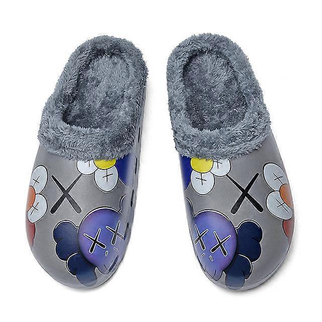 A pair of female warm plush slippers