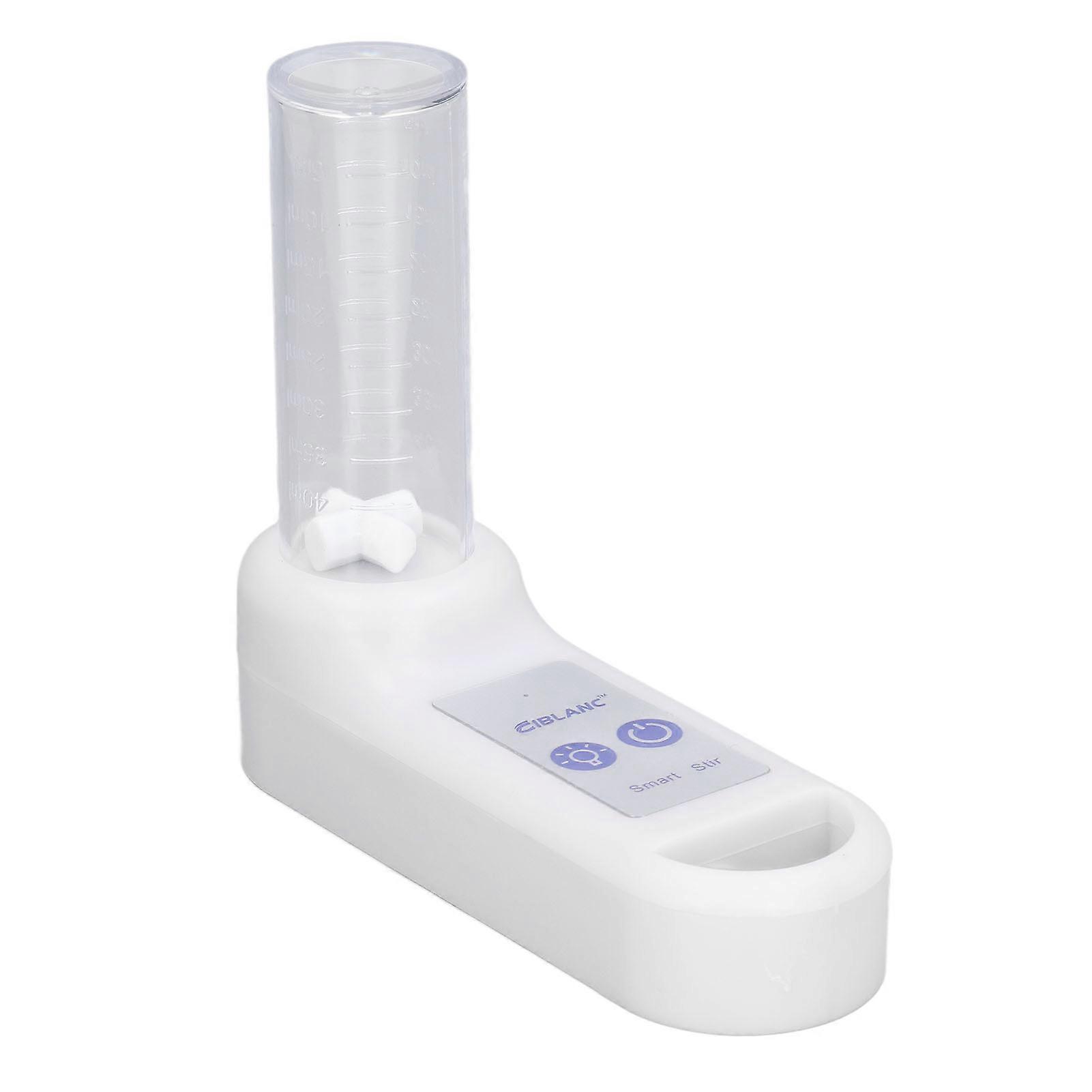 Portable laboratory magnetic stirrer with cross magnet