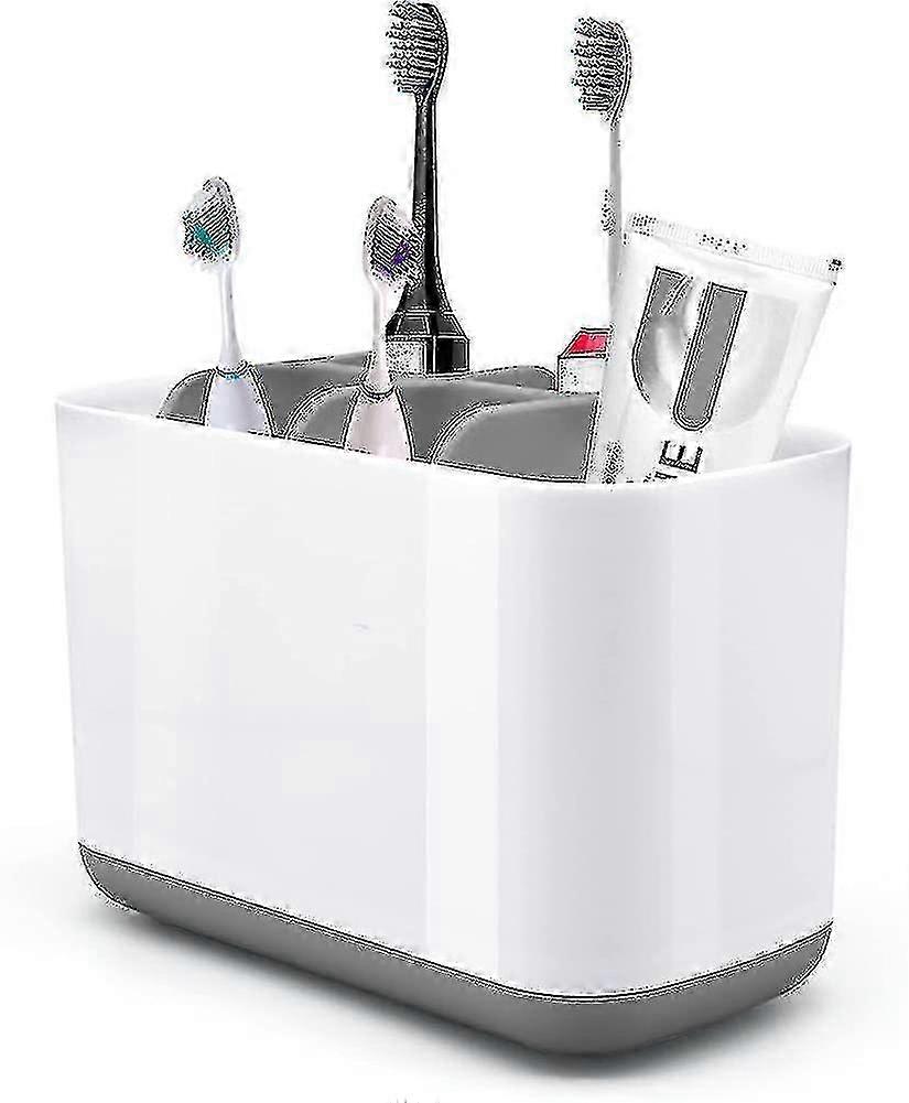 Space-saving toothbrush holder for electric toothbrush and toothpaste stand